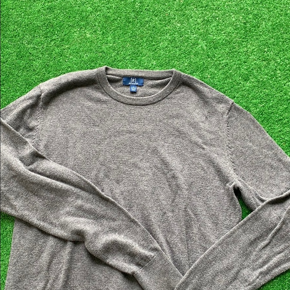 A comfortable grey sweater.